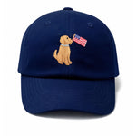 Show off your patriotic spirit with the Bits & Bows Patriotic Dog Baseball Hat—a navy blue hat for dogs featuring an embroidered design of a lovable pup holding an American flag in its mouth on the front.