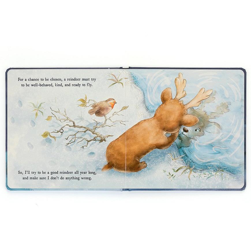 Mitzi Reindeer's Dream Book by Jellycat with a reindeer  looking at reflection in a pond of ice water.