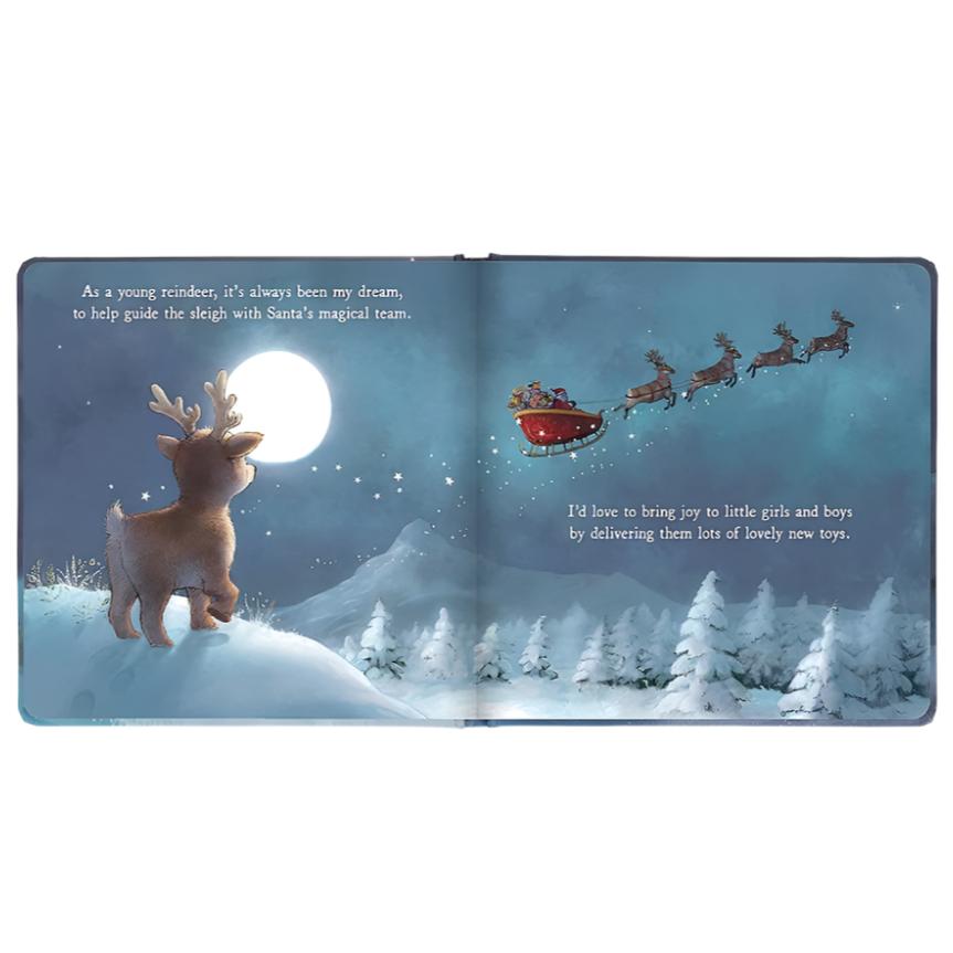 Mitzi Reindeer's Dream Book by Jellycat with blue background featuring a moon, reindeer and Santa's Sleigh in the sky.