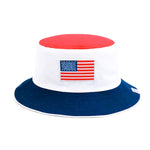 Show your patriotic spirit with the Bits & Bows American Flag Bucket Hat, a red, white, and blue reversible hat featuring a prominent American flag patch on the front. Ideal as a sun hat for outdoor adventures or any patriotic celebration.