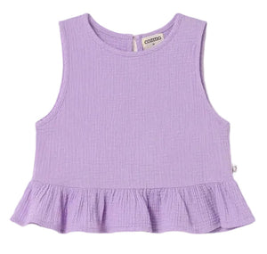 The Cozmo Girls' Blair Top is a sleeveless lavender peplum with a ruffled hem, made from textured cotton gauze and finished with a back button closure.