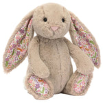 Blossom Beige Bunny 'Petal' by Jellycat is a plush bunny with long floppy ears and wildflower-patterned inner ears and feet—an adorable addition to any Garden Club collection.