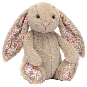 Blossom Beige Bunny 'Petal' by Jellycat is a plush bunny with long floppy ears and wildflower-patterned inner ears and feet—an adorable addition to any Garden Club collection.