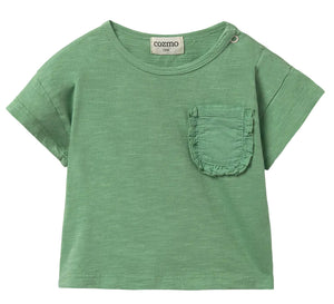 The Cozmo Baby Girls' Brisa Ruffle Pocket T-Shirt is a green, short-sleeve cotton tee with a round neck, chest ruffle pocket, and metal snap button on the shoulder—perfect for toddler girls.