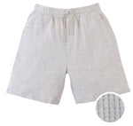 Gingersnaps Boys' Denzel Waffle Knit Drawstring Shorts feature a light gray melange color, textured waffle knit finish, elastic waistband, and side pockets. A circular inset shows off the unique pattern.