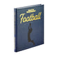 The leather-bound book titled "The Story of Football" by Graphic Image, adorned with a silhouette of a football player on its cover, celebrates iconic moments from Vince Lombardi's legacy to thrilling Super Bowls in NFL history.