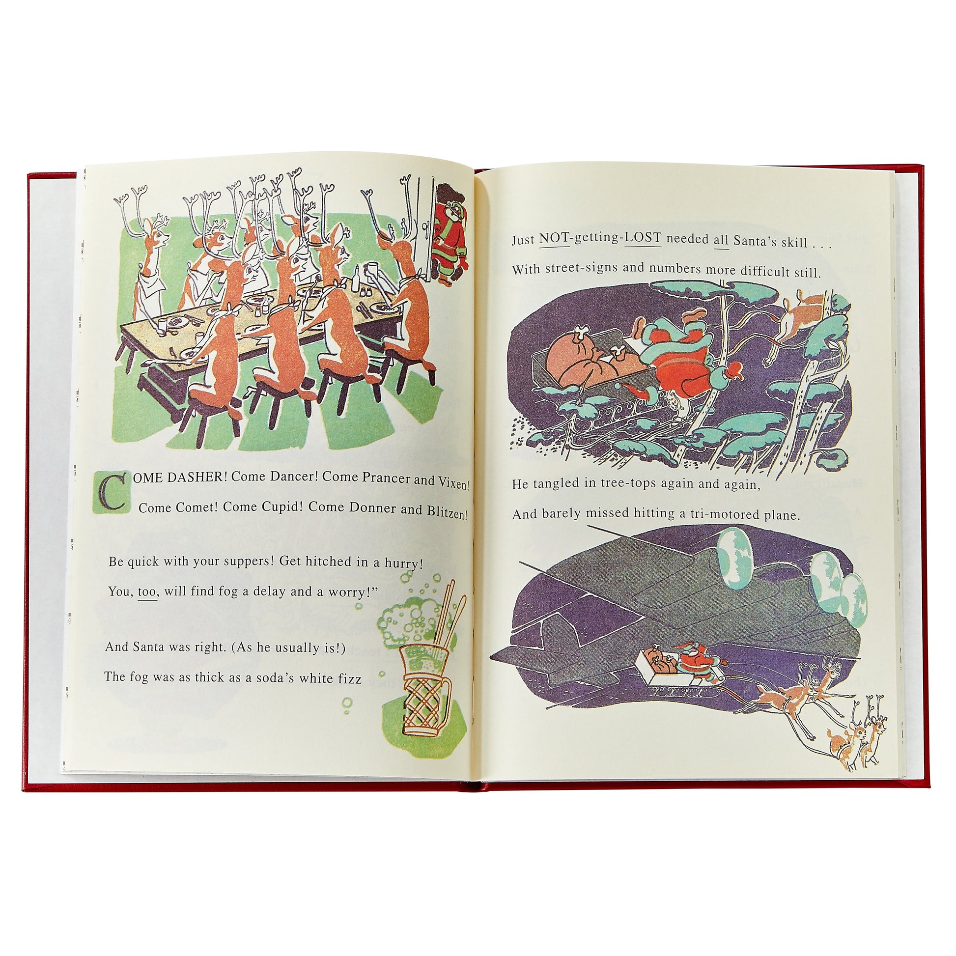 The Graphic Image Rudolph the Red Nosed Reindeer Leather Book is open to illustrated pages showing reindeer dining and Santa steering his sleigh, with rhyming Christmas story text.