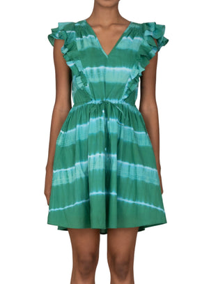 Person wearing the **Banjanan Felka Dress** by **Banjanan**, a green and blue tie-dye casual mini dress with ruffled shoulders, a gathered drawstring waist, and a V-neckline.