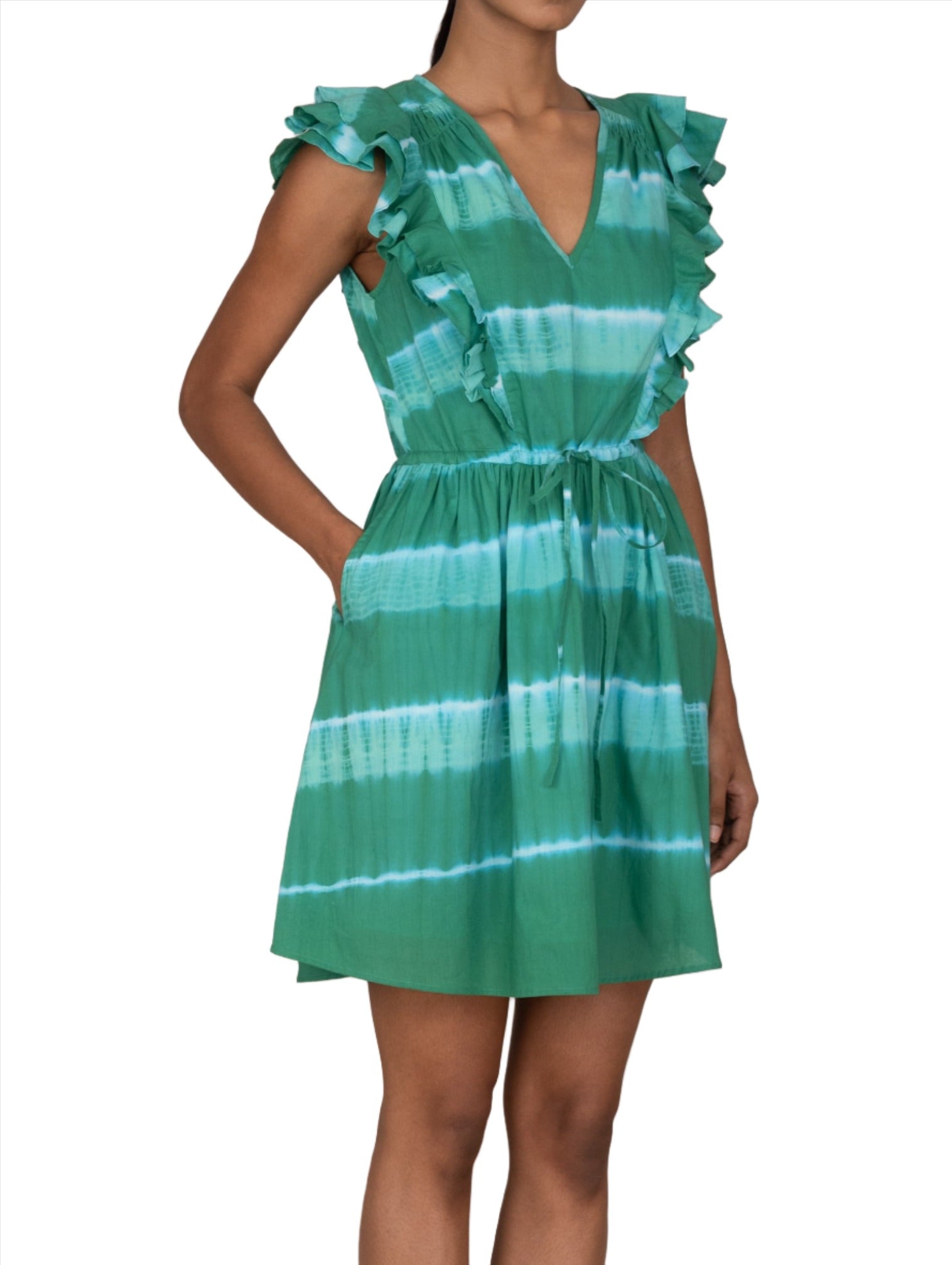 A person is wearing a green Banjanan Felka Dress by Banjanan.