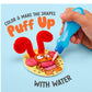 A hand uses a blue water dropper to apply water to a colorful crab craft, making red pipe cleaner shapes puff up. Text reads: "Color & make the shapes puff up with water using Puffy Pages by Bright Stripes." Dive into creative on-the-go fun as you bring sea animals to life in vibrant 3D scenes!.