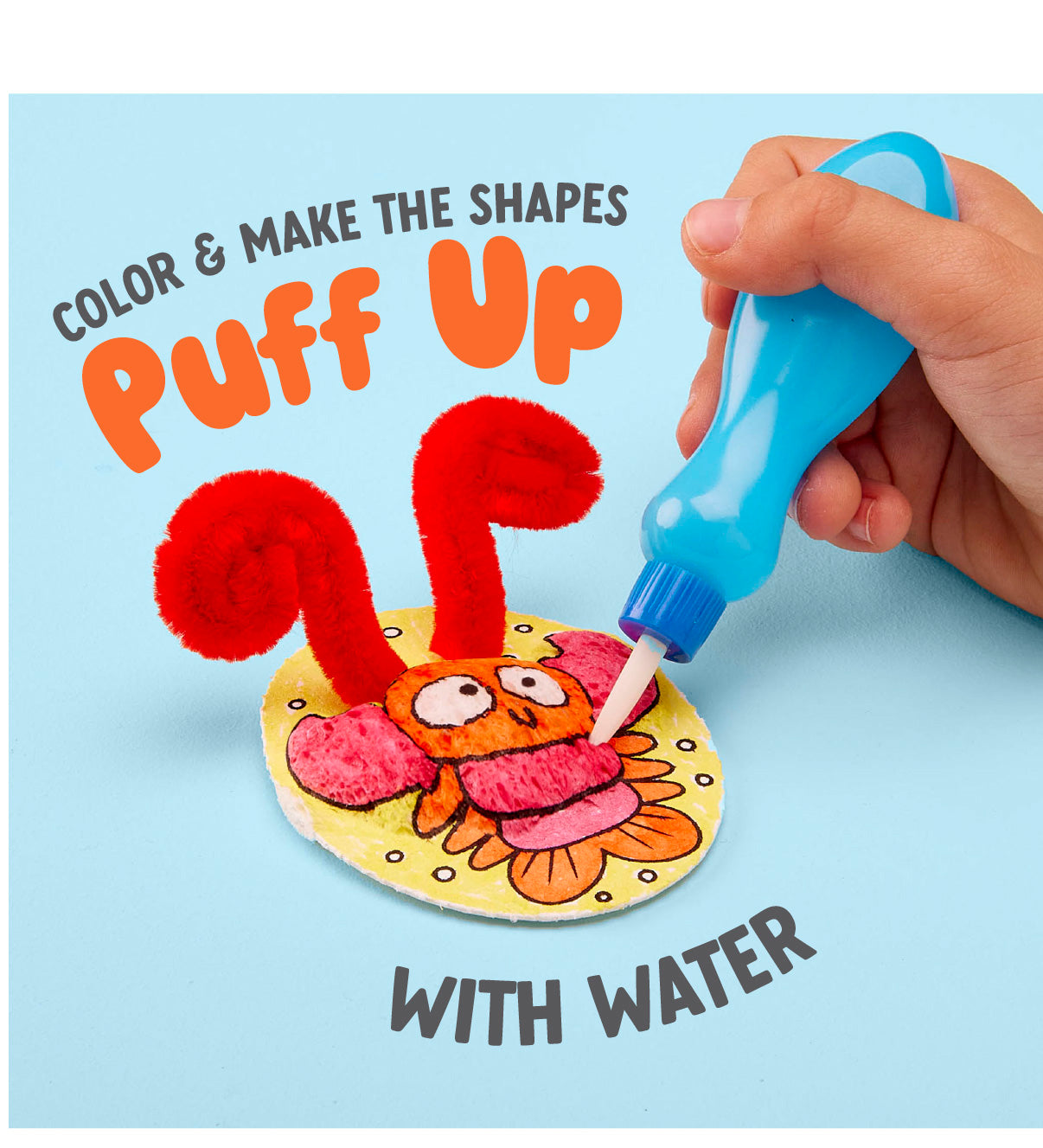 A hand uses a blue water dropper to apply water to a colorful crab craft, making red pipe cleaner shapes puff up. Text reads: "Color & make the shapes puff up with water using Puffy Pages by Bright Stripes." Dive into creative on-the-go fun as you bring sea animals to life in vibrant 3D scenes!.