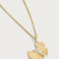 The Anabel Aram Butterfly Gold Necklace features a textured 18k gold butterfly pendant with a diagonal row of hand-set crystals on the wings, shown against a plain background.