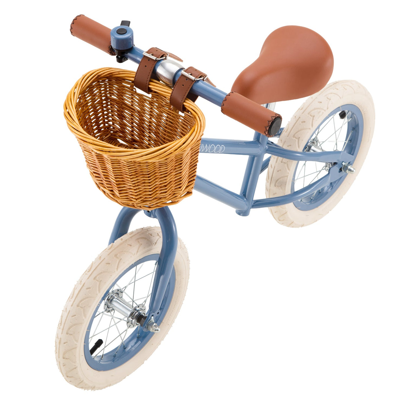 Banwood Kids’ Vintage First Go Balance Bike, in blue, features white tires, a brown seat, matching handlebars, and a charming woven basket attached to the front.