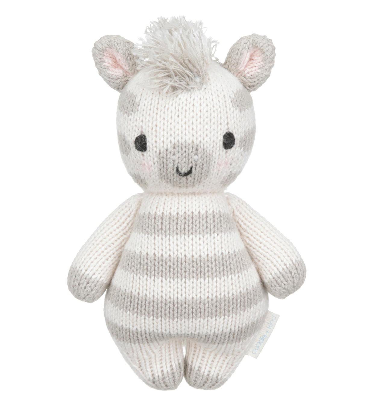 Introducing the Zebra - Baby 7" by Cuddle + Kind, a hand-knit baby animal crafted from heirloom-quality Peruvian cotton yarn. This plush toy showcases gray and white stripes, small ears, black eyes, a smiling mouth, and a tuft of yarn hair on top—making it a charming keepsake to treasure for years to come.