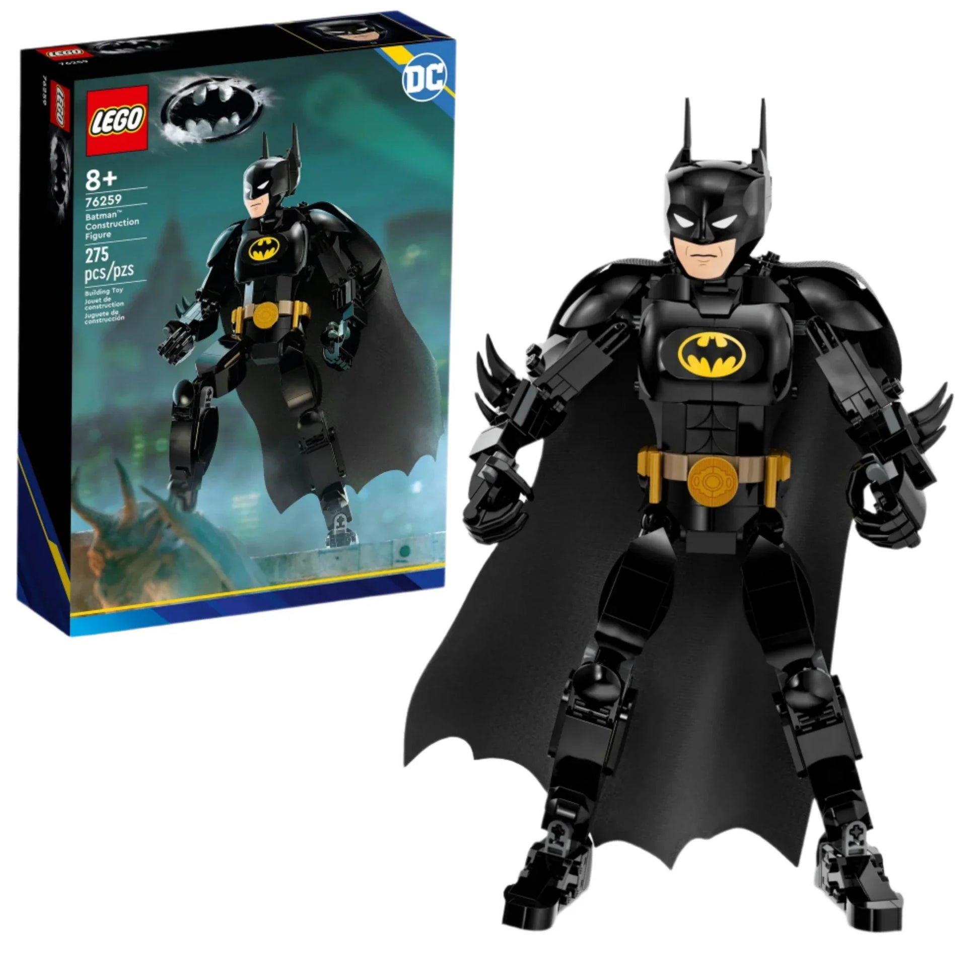 Photograph featuring the LEGO® Batman™ Construction Figure. The assembled LEGO figure is posed in front of its product box, which showcases the figure and prominently displays the DC logo. This product is from Legos - Toyhouse.