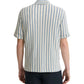 A person shown from the back wears the vince Playa Stripe Shortsleeve Shirt, featuring airy Italian cotton-blend fabric and vertical blue and white seaside-inspired stripes.