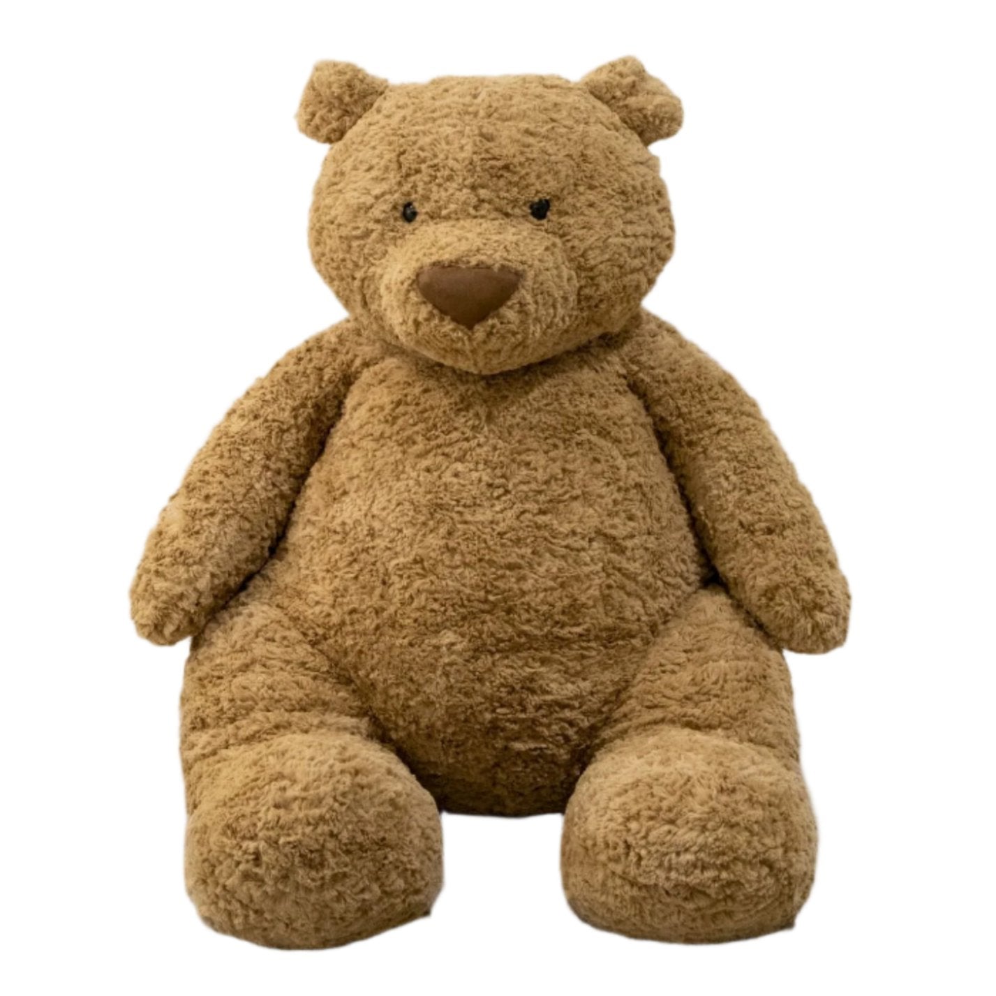 The Jellycat Bartholomew Bear, Gigantic by Jellycat is a large, light brown Teddy bear with a soft, fluffy texture. It has small, rounded ears and a dark brown nose. This bedtime buddy features a fluffy fudge tummy and sits in an upright position, ready for snuggles.