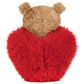 The Jellycat Bartholomew Bear 'Heartthrob' features a plush toffee bear with light brown fur snuggled in a bright red, heart-shaped fluffy blanket, facing away.