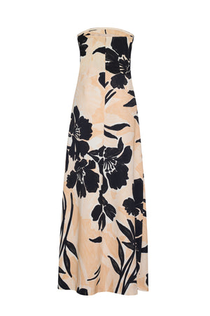 The Cara Cara Benita Dress is a strapless, ankle-length fit-and-flare gown in stretch crepe with a beige base and bold black floral print, shown on a plain white background.