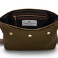 Bennett Winch Canvas Wash Bag in open green canvas features brown leather accents, a YKK brass zipper, gold snaps, and an interior label with the "Bennett Winch" brand.