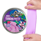 A tin labeled “Crazy Aaron’s Better Butter - Berry Thinking Putty” features a cartoon cow and contains berry-scented, light purple putty. A hand is stretching the soft Thinking Putty next to the tin, making it perfect for sensory play.
