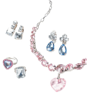 The Super Smalls Big Presentation Jewelry Set features pastel elegance with a pink gemstone necklace, blue gemstone earrings, and a pink-and-blue ring, all displayed beautifully on a white background.