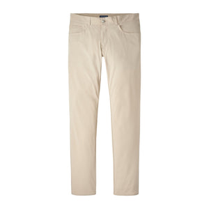 The Bingham Performance Five-Pocket Pant by Peter Millar is a pair of beige slim-fit pants with front and back pockets, crafted from Italian knit fabric for a refined look, and shown against a white background.