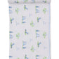 The Kissy Kissy Fairway Foursome Printed Blanket, made from folded Pima cotton, features a golf-themed print with golfers, clubs, and flags in blue and green on a white background.