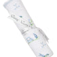 White Pima cotton Kissy Kissy Fairway Foursome Printed Blanket with blue golf-themed designs, rolled and tied with a "Kissy Kissy" ribbon.