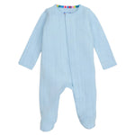 The Magnetic Me Love Lines Pointelle Footie is a light blue baby onesie featuring long sleeves and footed legs, made from organic cotton, and displayed against a white background.