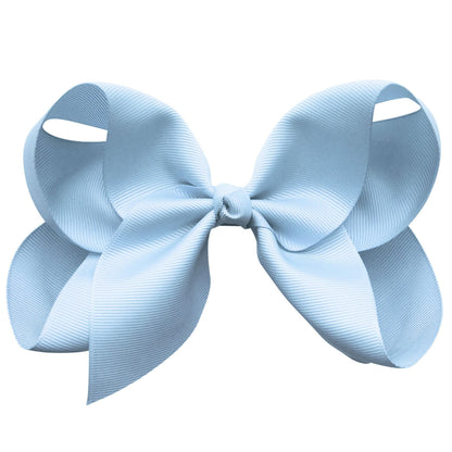 The Milledeux® Jumbo Boutique Bow in Bluebell, secured with an alligator clip, showcases wide loops and tails crafted from OEKO-TEX® ribbon for a touch of eco-friendly elegance.