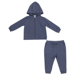 The Angel Dear Footballs Inky Blue French Terry Hoodie & Jogger Set is crafted from organic cotton and includes a zip-up hoodie and drawstring pants, both featuring front pockets, offering a perfect blend of comfort and style for your little one.