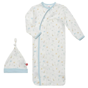 The Magnetic Me Blue Little Bitty Gown and Hat for newborns to 3 months is an eco-friendly TENCEL modal sleeper gown featuring a delightful animal pattern, accented with light blue trim and practical magnetic closures. It includes a coordinating knotted hat, creating a cozy and stylish outfit for your baby.