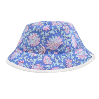 The Louise Misha Baby Lajik Sun Hat is a chic reversible sun hat featuring a blue bucket design with pink and light blue floral patterns, white trim edges, and is crafted from lightweight cotton voile for stylish sun protection.