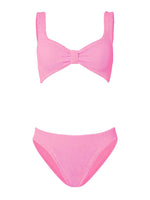 The Hunza G Bonnie Bikini is a two-piece pink, textured retro set with a supportive knotted front top and high-waist briefs, shown on a white background.