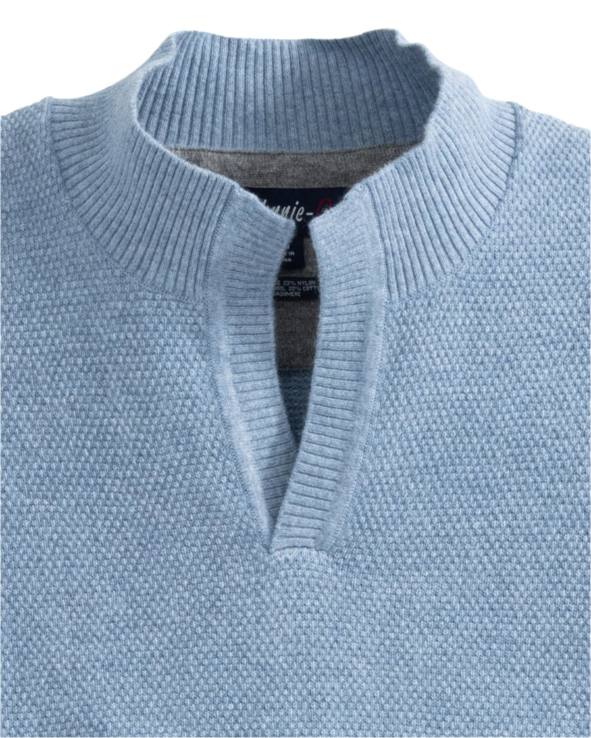 Experience the luxurious softness of the Johnnie-O Estaban Quarter Slit Sweater, a light blue knitted pullover featuring a Johnny collar and textured pattern, crafted from fine merino wool.