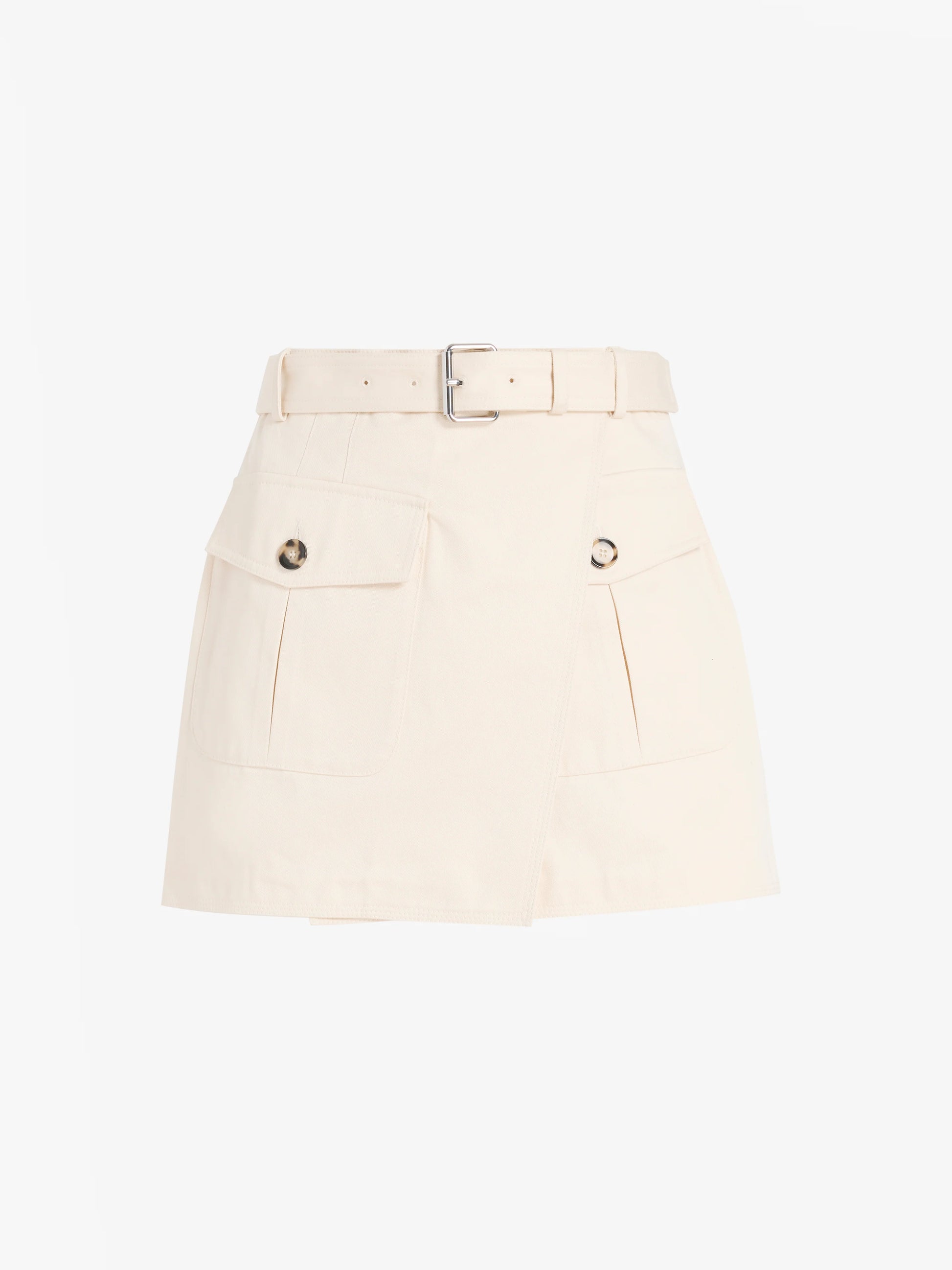 The Bruni Short by Proenza Schouler is a beige A-line mini skirt featuring front flap pockets, button details, and a matching belt with a silver buckle. Crafted from durable and structured cotton drill, it offers a chic alternative to classic high-rise shorts for any modern wardrobe. Displayed against a plain white background.