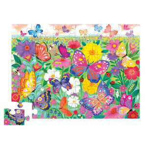 The Crocodile Creek Butterfly Garden 36 Piece Puzzle showcases vivid butterflies and flowers in its colorful illustrations, partially assembled with a missing piece in the corner.