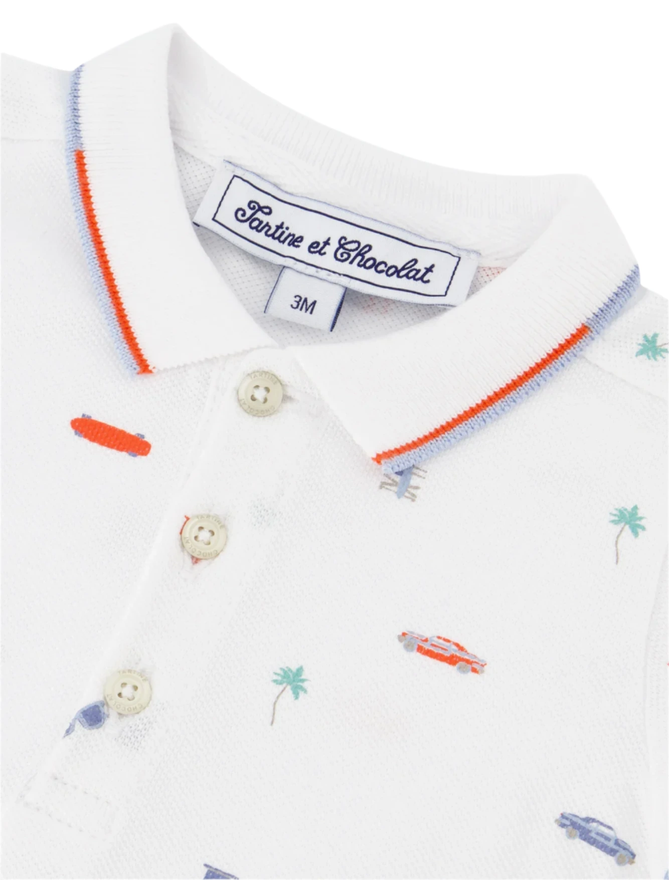 The Baby Boys' and Boys' Spicy Orange Polo by Tartine et Chocolat showcases Miami's sunny spirit with small car, palm tree, and surfboard prints, complete with vibrant orange and blue collar trimming for a City Adventure feel.