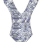The Lisette One Piece by Carolina K features a deep V-neck and bold blue and white abstract tiger stripe print, offering stylish design and added UV protection.