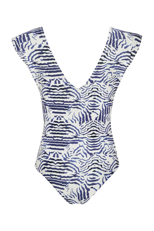 The Lisette One Piece by Carolina K features a deep V-neck and bold blue and white abstract tiger stripe print, offering stylish design and added UV protection.