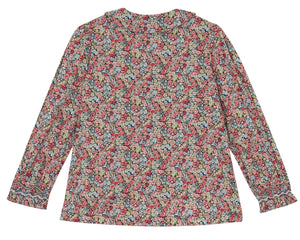 The Tartine et Chocolat Girls' Liberty Smocked Floral Tunic features long sleeves and a vibrant, densely packed Liberty print, shown flat from the back.
