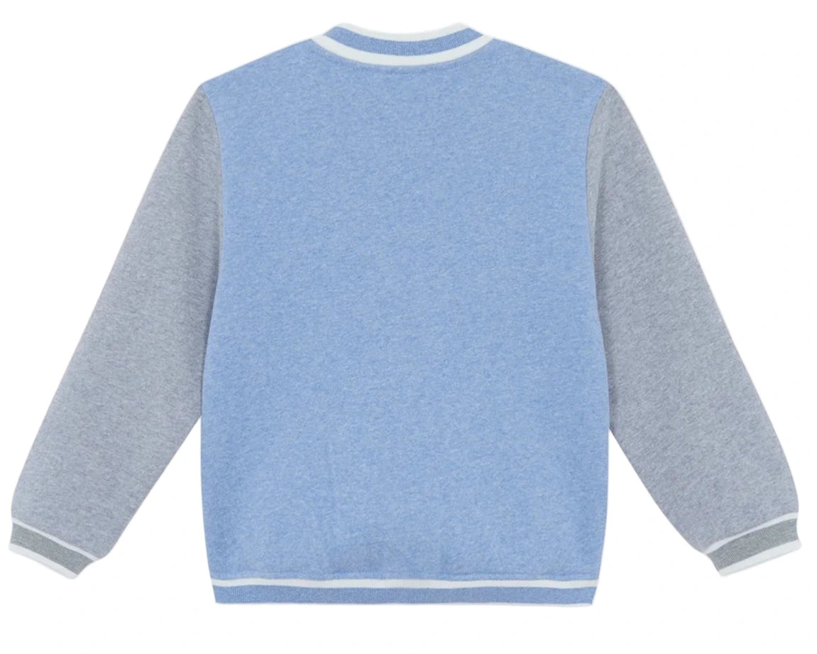 The Tartine et Chocolat Baby Boys' and Boys' Easy Bomber Cardigan is shown from the back in blue and gray varsity style, with light gray sleeves and white trim.