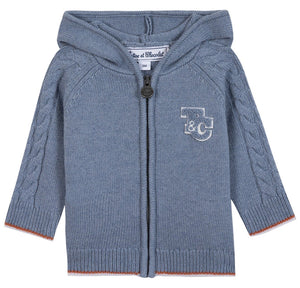 The Tartine et Chocolat Baby Boys' and Boys' TC Signature Knit Zip Jacket features a light blue color, hood, zipper closure, cable knit sleeves, and a “T&C” monogram on the left chest for a classic touch.