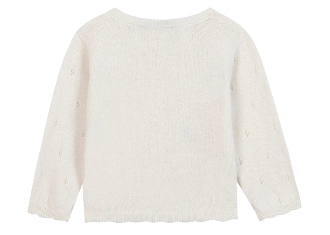 The image shows the back of the Tartine et Chocolat Baby Girls' and Girls' Emeraude Embroidery Floral Cardigan, an off-white wool design with long sleeves and subtle decorative holes.