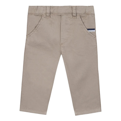 Tartine et Chocolat Baby Boys' and Boys' Trouser Pants in beige, with front pockets, belt loops, and a small navy accent on the right pocket, shown against a white background.