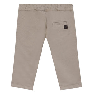 Tartine et Chocolat Baby Boys' and Boys' Trouser Pants in beige feature an elastic waistband, right back pocket with a small brown label, ideal for baby and junior boys. Shown on a white background.