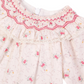 The Tartine et Chocolat Baby Girls' Ruffle Collar Embroidery Floral Dress features light pink fabric, a smocked ruffle collar, hand-embroidered pink flowers, red embroidery accents, and delicate lace trim.