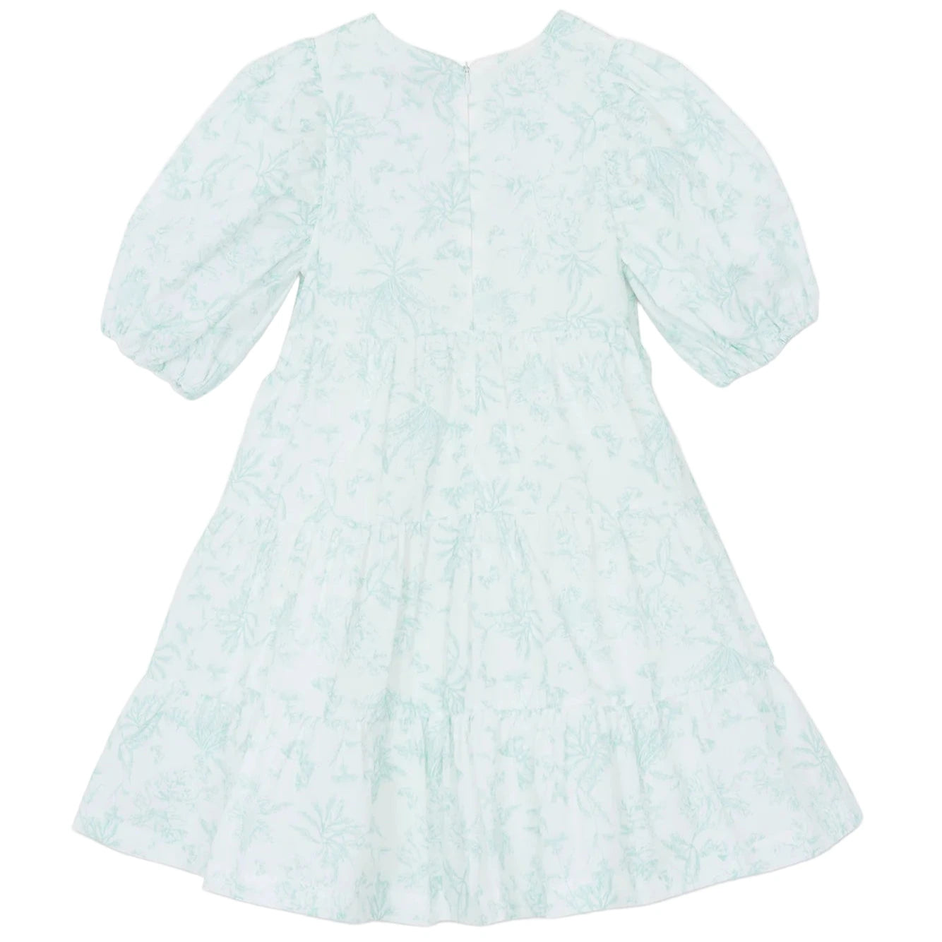 The Baby Girls' and Girls' Puff Sleeve Dress by Tartine et Chocolat features a light blue and white Toile de Jouy floral pattern, short puffed sleeves, and a tiered skirt, displayed against a plain white background.