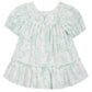 The Tartine et Chocolat Baby Girls' and Girls' Puff Sleeve Dress features a white design with light green floral print, ruffled hem, gathered shoulders, and a back zipper for an elegant look.